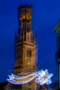 Abstract image of Belfry of Bruges with Christmas decoration