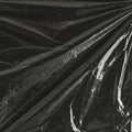 Abstract image of a black plastic sheet with folds and creases. The surface is shiny an Royalty Free Stock Photo