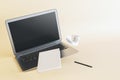 Abstract image of blank laptop, coffee cup, notepad and pen on light background. Remote work, online education concept. Mock up,