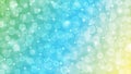 Abstract Blurred Bokeh, Sparkles and Bubbles in Pastel Green, Blue and Yellow Gradient Background Royalty Free Stock Photo