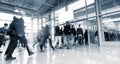 Abstract Image of Business People Walking at a International Trade Fair Royalty Free Stock Photo