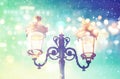 Abstract image of Christmas street lights with glitter overlay Royalty Free Stock Photo