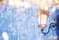 Abstract image of Christmas street lights with glitter overlay Royalty Free Stock Photo