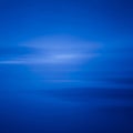 Abstract Blue Background with Horizontal Streaks of Light and Soft Focus texture Royalty Free Stock Photo