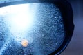 Abstract image of drops in the rain on Car Mirror. Royalty Free Stock Photo