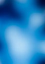 Abstract image featuring a blurred gradient of blue tones, ranging from deep navy to Royalty Free Stock Photo