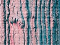 An abstract image featuring a combination of vertical and circular geometric patterns overlaid on a textured