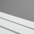 Abstract image featuring three white diagonal lines set against a smooth grey Royalty Free Stock Photo