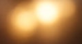 Abstract image featuring a warm, golden bokeh effect with diffused light sources creating a soft, Royalty Free Stock Photo