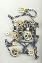 Abstract image with gears, chain and a metal object