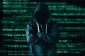 The abstract image of the hacker standing and the binary code image is backdrop. the concept of cyber attack, virus, malware, ille