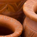 Abstract image of hand made earthen pots with design Royalty Free Stock Photo