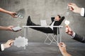 Abstract image of hands offering money, ideas, keys, lamps and devices to relaxing young businessman in concrete interior. Royalty Free Stock Photo