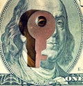 abstract image of a key on a dollar bill as a symbol of financial sanctions (corruption, lobbying, financial secrecy - concept). Royalty Free Stock Photo