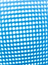 abstract image of a kind of blue net with.  several holes. Royalty Free Stock Photo