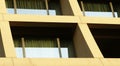 Abstract image of looking up at modern glass and concrete building. Architectural exterior detail of office building