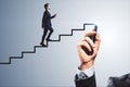 Abstract image of man climbing hand drawn stairs on background. Teamwork, success and career development concept Royalty Free Stock Photo