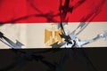 Abstract image of the national flag of Egypt with twisted barbed wire Royalty Free Stock Photo