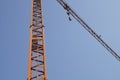 abstract image, part of arm machinery construction crane with blue sky background