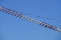 Abstract image, part of arm machinery construction crane with blue sky background Royalty Free Stock Photo