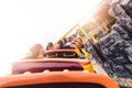 The abstract image of the roller coaster running on the rail in amusement park.