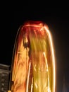 Abstract image of a rotating ferris wheel at night due to motion blur Royalty Free Stock Photo