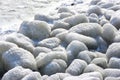 Ice covered granite stones in winter Royalty Free Stock Photo