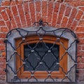 Simple photo background pattern of window with beaten shutters and red bricks around