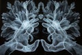 Abstract image of two hands in the form of ghostly smoke. Royalty Free Stock Photo