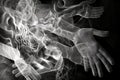 Abstract image of two hands in the form of ghostly smoke. Royalty Free Stock Photo
