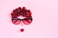 abstract image young woman from sweet cherry and glasses. Concept