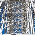 Abstract impression due to the confusing supports, struts and slats on the mount of a Ferris wheel Royalty Free Stock Photo