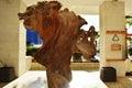 Abstract installation of a huge brown tree root