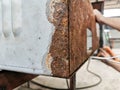 Abstract iron rusty on electrical metal cabinet for background purpose. Selective focus. Royalty Free Stock Photo