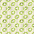Abstract kiwi slices seamless pattern on checkered distorted background. Psychedelic print
