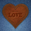 Abstract leather heart on jeans texture Royalty Free Stock Photo