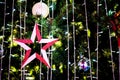 Abstract light background red white star from decorated christmas tree Royalty Free Stock Photo