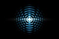 Abstract light blue ball effect with sound waves oscillating on black background Royalty Free Stock Photo