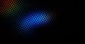 Abstract light blue dots overlay colorful pattern with circles geometry halftone texture on dark black Royalty Free Stock Photo