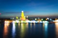 Abstract light bokeh of Wat Arun Temple with Chaophraya river- Bangkok