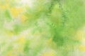 Abstract light color watercolor background. Hand drawn yellow, green, white gradient painting.