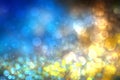 Abstract light golden gradient blue festive background texture with glitter sparkle blurred circles and bokeh lights Royalty Free Stock Photo