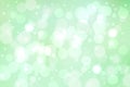 Abstract light green and white delicate colorful pastel spring or summer bokeh background with glittering stars and space.