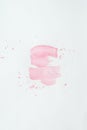 Abstract light pink watercolor strokes with splatters