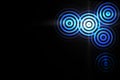 Abstract light ring effect with blue sound waves oscillating on black background Royalty Free Stock Photo