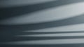 Abstract light and shadow patterns on a dark grey surface Royalty Free Stock Photo