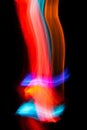 Abstract Light Trails Dance in the Darkness Capturing Dynamic Motion Royalty Free Stock Photo