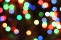 Abstract lights bokeh blue, green, red and white tones on black background. Royalty Free Stock Photo