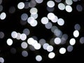 Abstract lights as a de-focused on black background Royalty Free Stock Photo