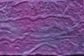 Abstract lilac coloured surface on stone